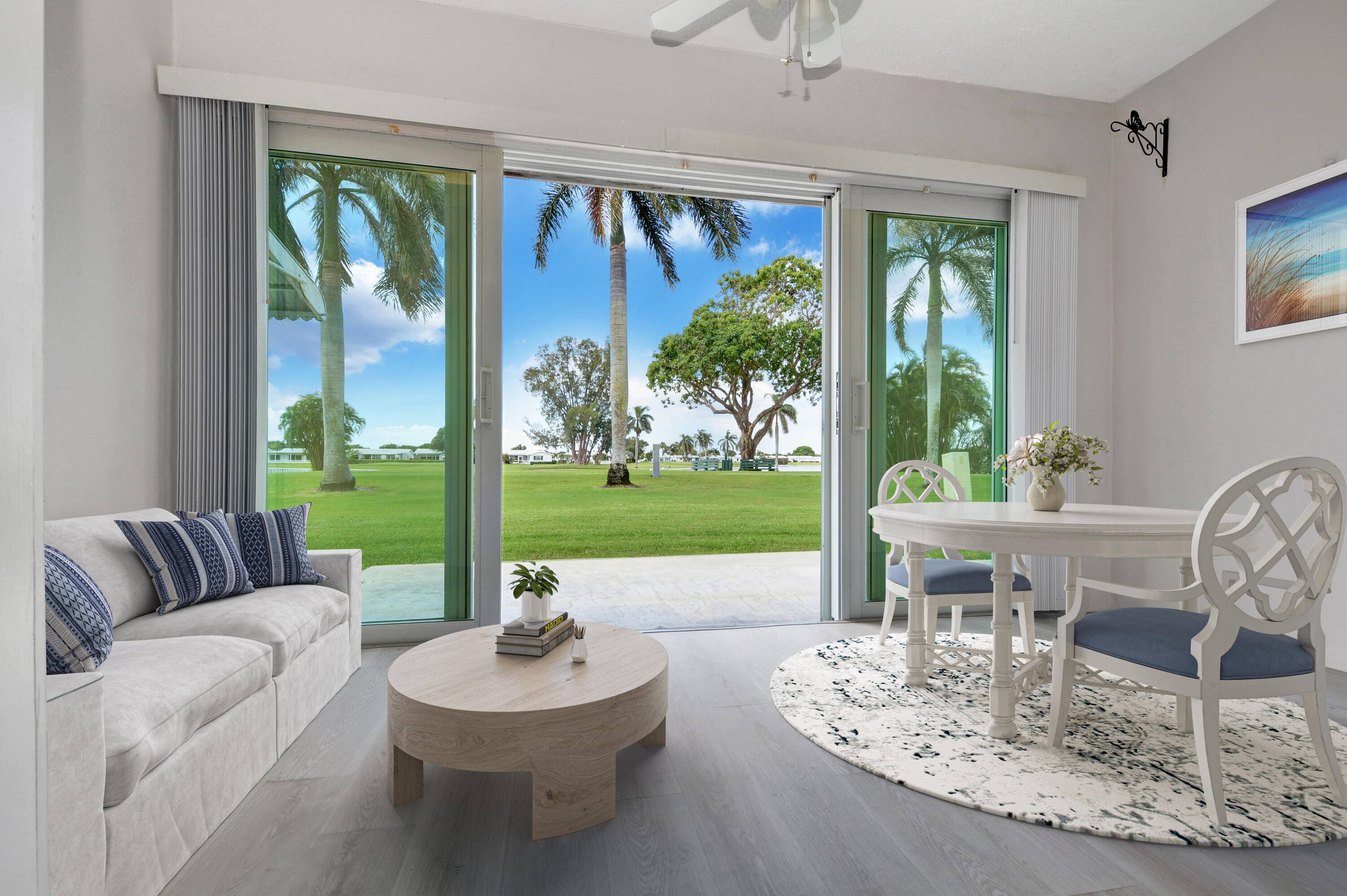 Panoramic golf and lake views from this niceupdated villa with paid up recreation lease in full.