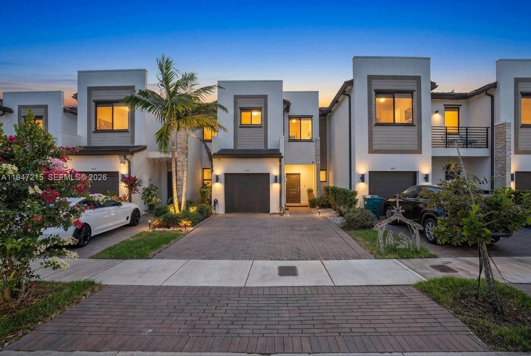 Wake up to lake views every morning in this stunning 2021 built townhouse nestled inside Paseos Via Ventura, one of Miami's newest gated communities with resort style amenities.