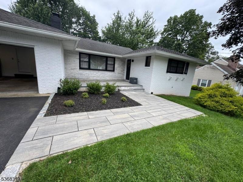 Welcome to 71 Haller Drive in Cedar Grove.