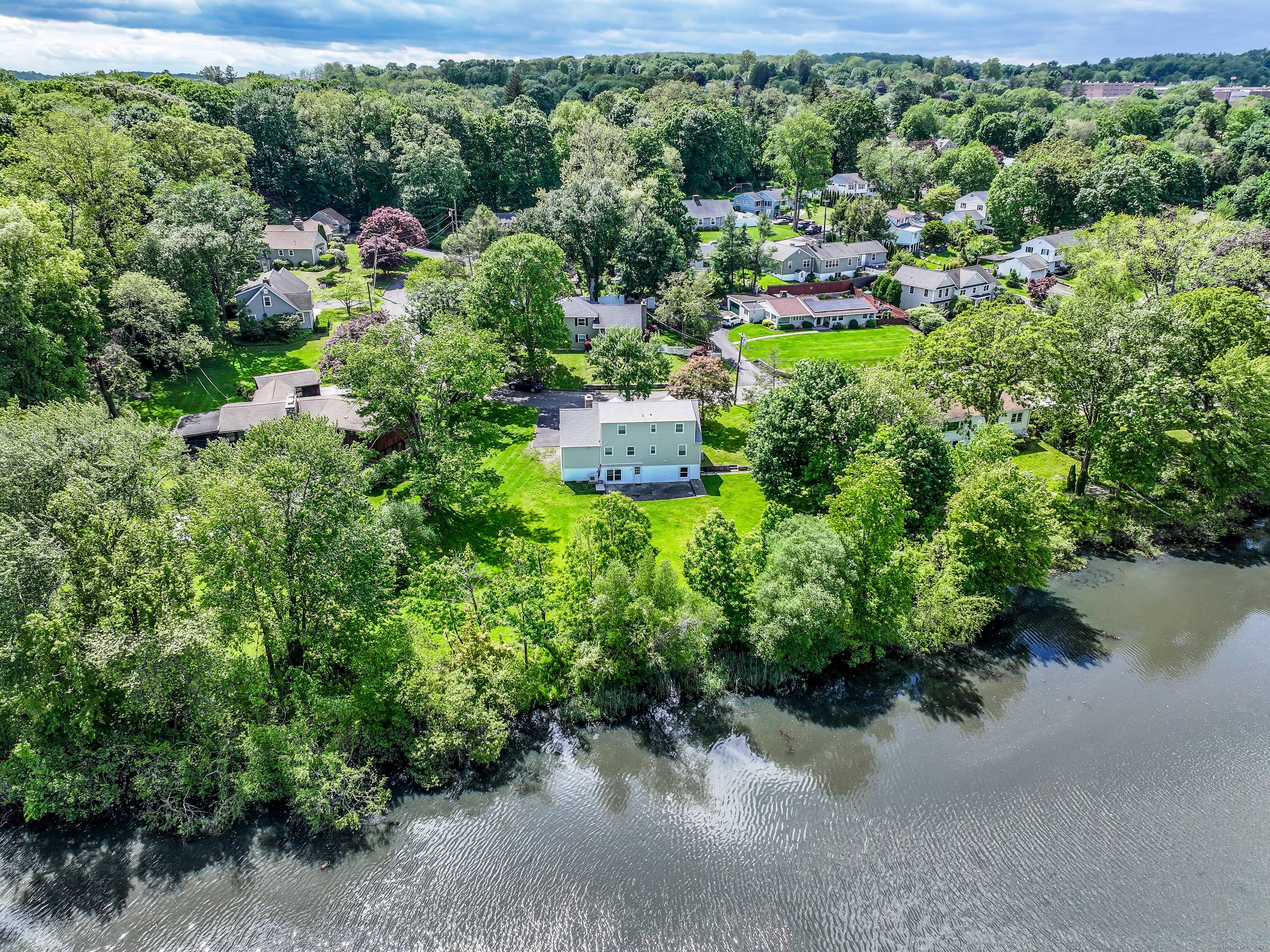 Thoughtfully renovated in 2023, this picture perfect Cape blends classic charm with modern updates offering a better than new living experience.