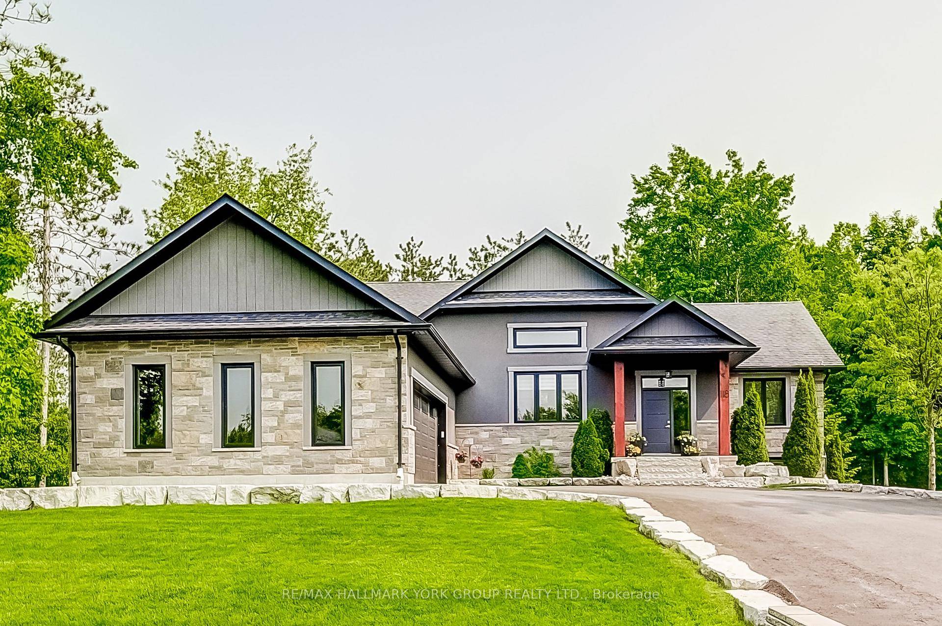 Set On A Serene amp ; Private Half Acre Lot In Desirable Minesing, Just Minutes From Snow Valley Ski Resort, This Custom Modern Bungalow Offers A Rare Blend Of Sophistication, ...
