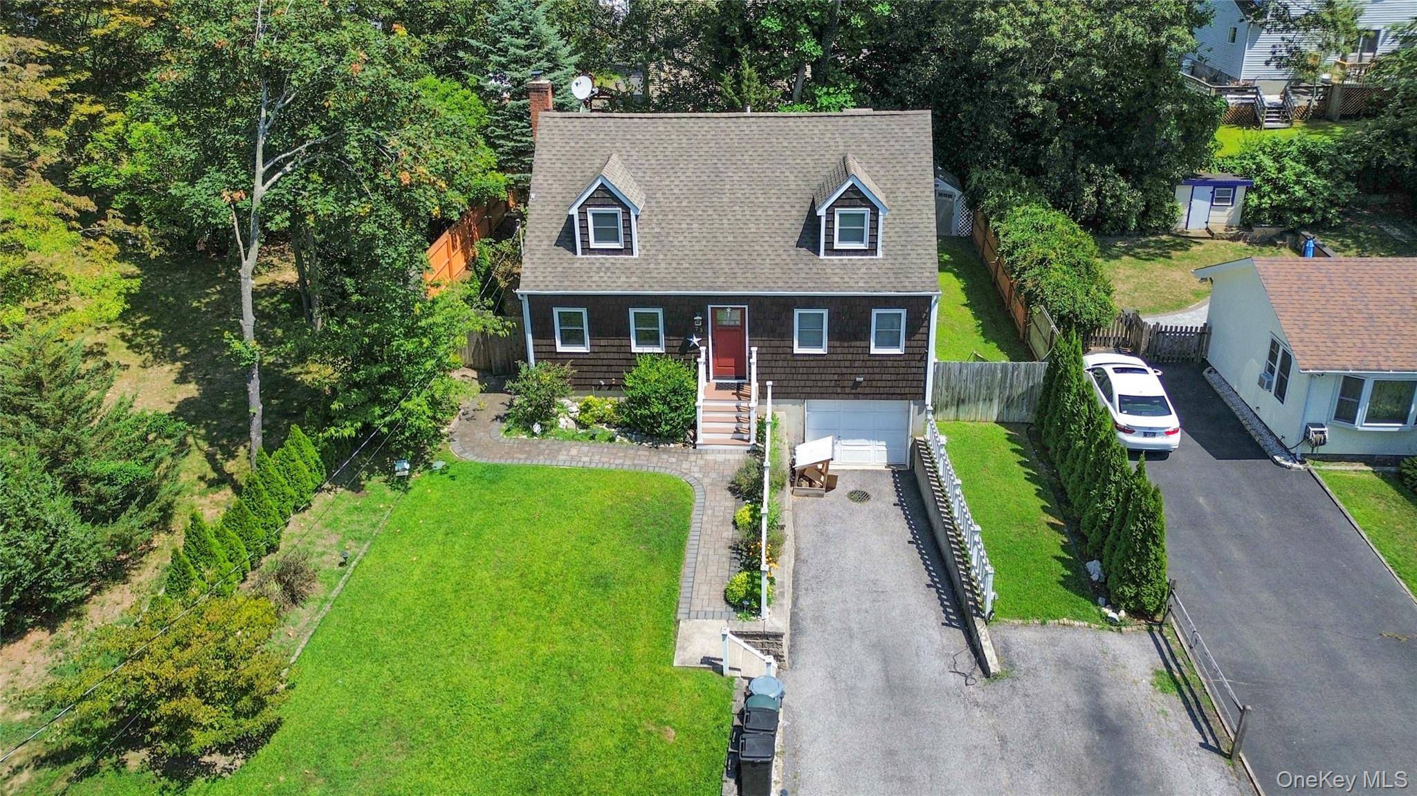 Welcome home to this beautifully updated 3 bedroom cape in the acclaimed Miller Place School District.