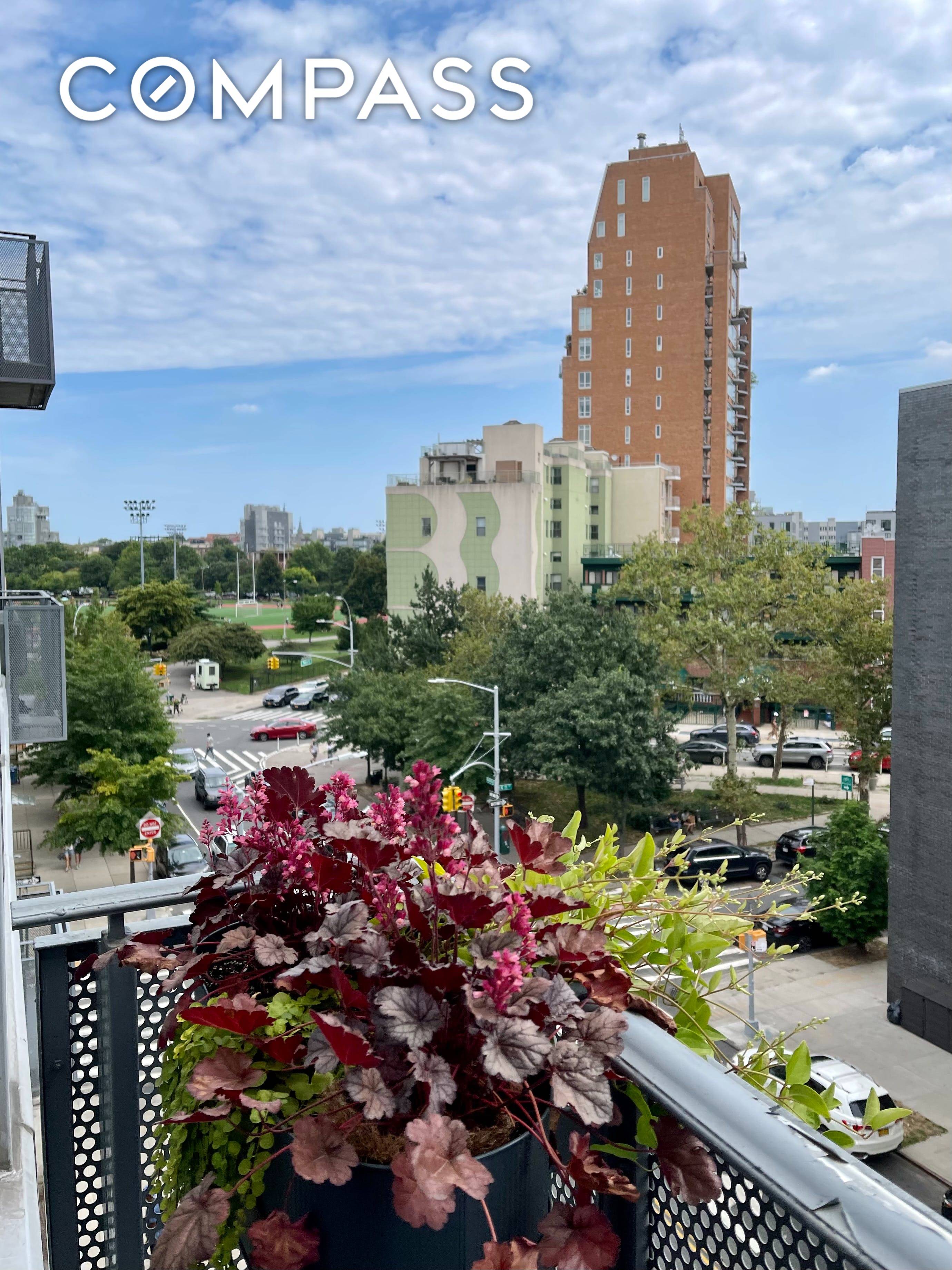 Love where you live ! This sun filled, spacious 1 BR luxury condo with a sweet juliet balcony feels like living in Paris !