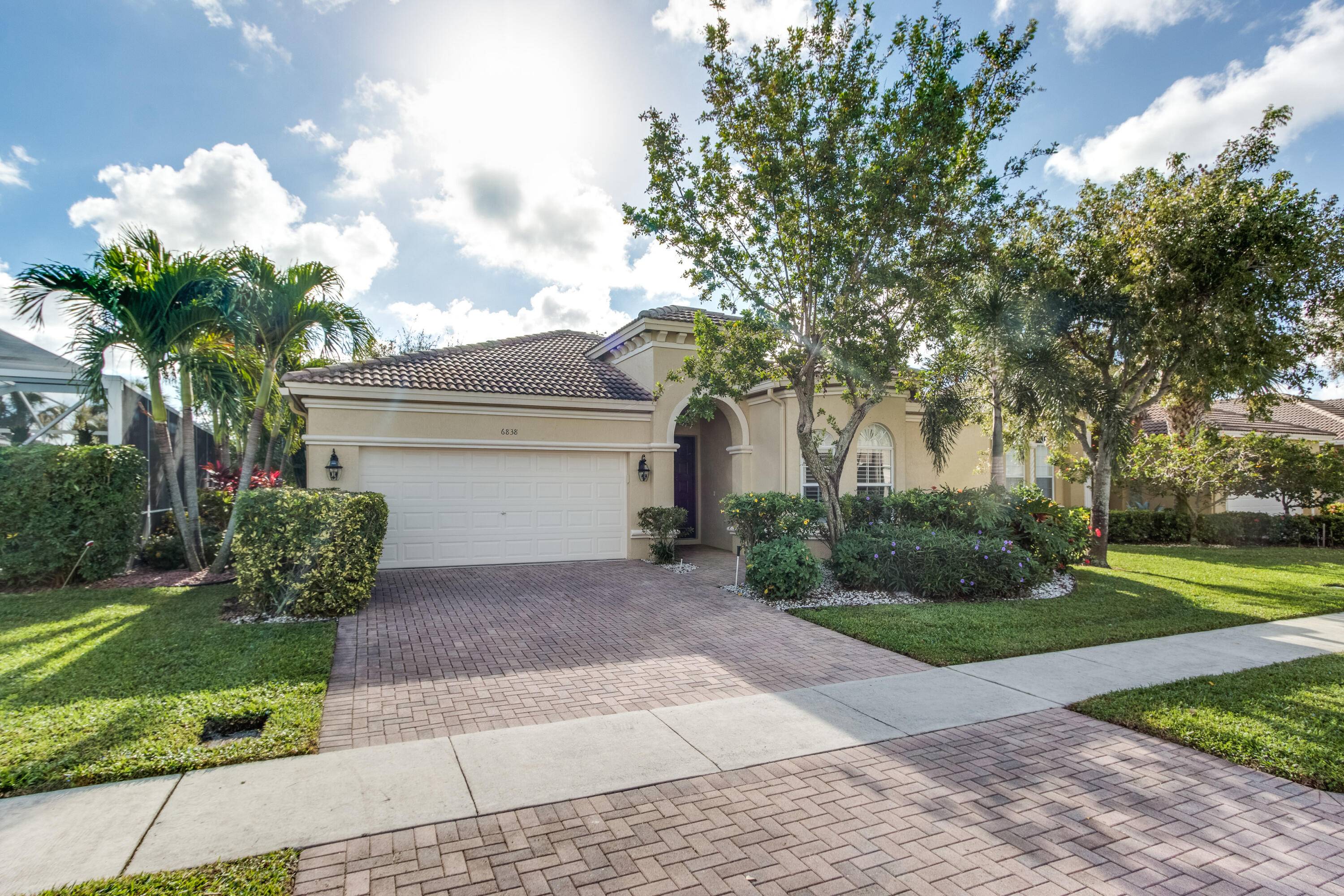 This charming 3 bedroom, 2 bathroom residence boasts an open floor plan and plenty of natural light, creating an inviting and spacious atmosphere.