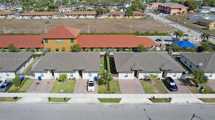 An exceptional opportunity to acquire a newly constructed duplex at 1538 W 26 Ct, Riviera Beach.