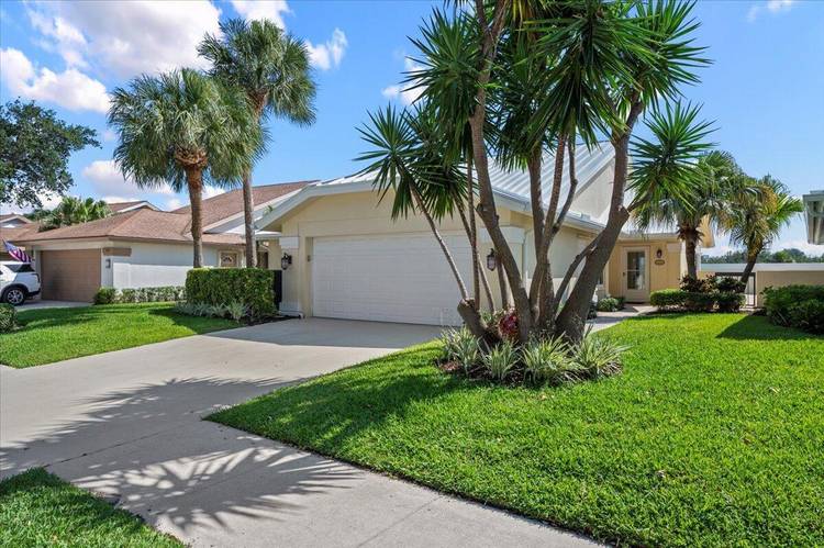 Welcome to 180 Ridge Rd, a beautifully positioned pool home in the highly sought after Ridge at the Bluffs in Jupiter.