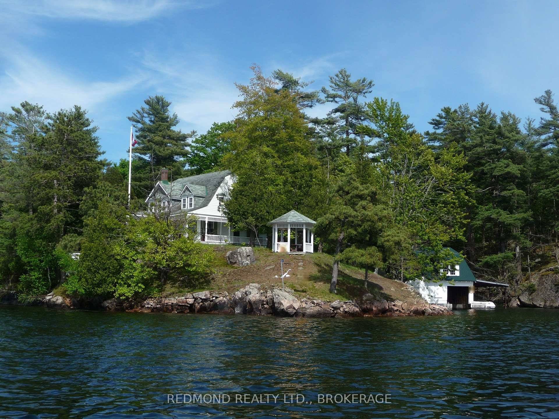 Perfectly poised on 1 acre of Club Island, St.