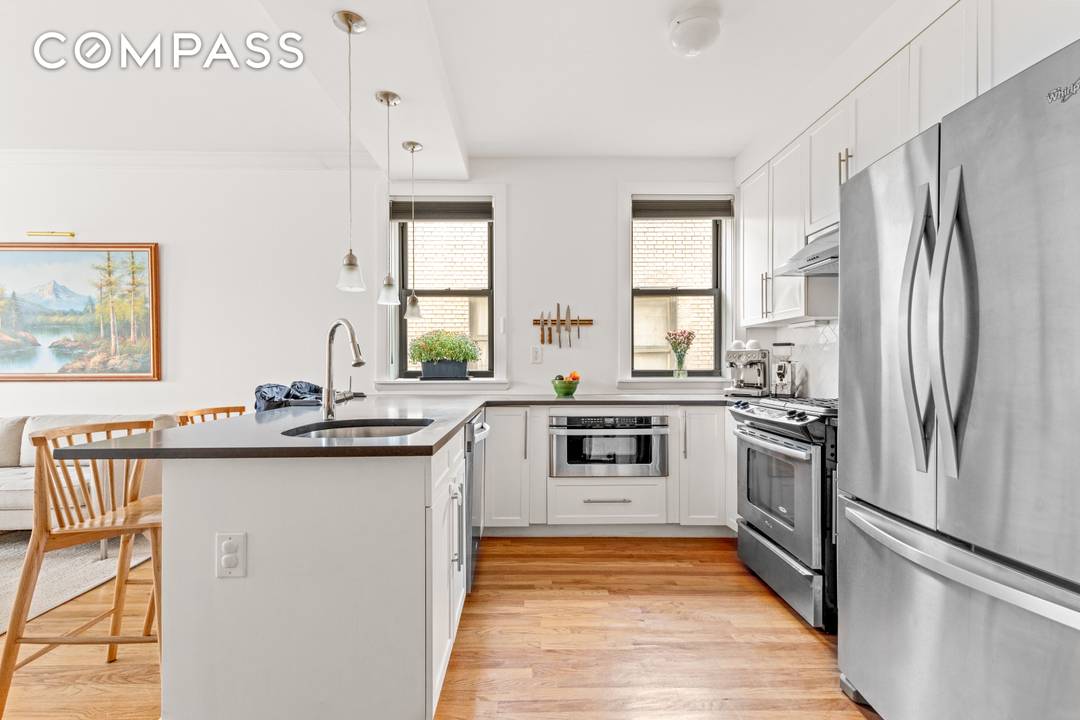 Pre War Elegance Meets Modern Living !