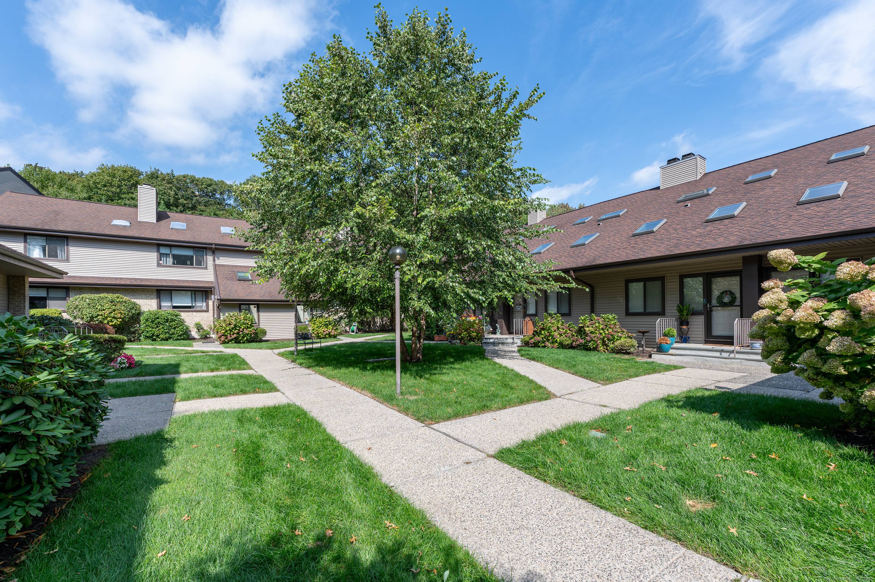 Nestled in a serene private enclave, this meticulously maintained condominium offers the perfect blend of luxury and convenience in one of Stamford's most sought after downtown locations.