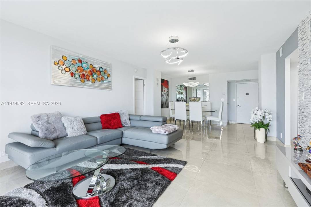 Enjoy breathtaking views from this exquisitely renovated condo and fully furnished.