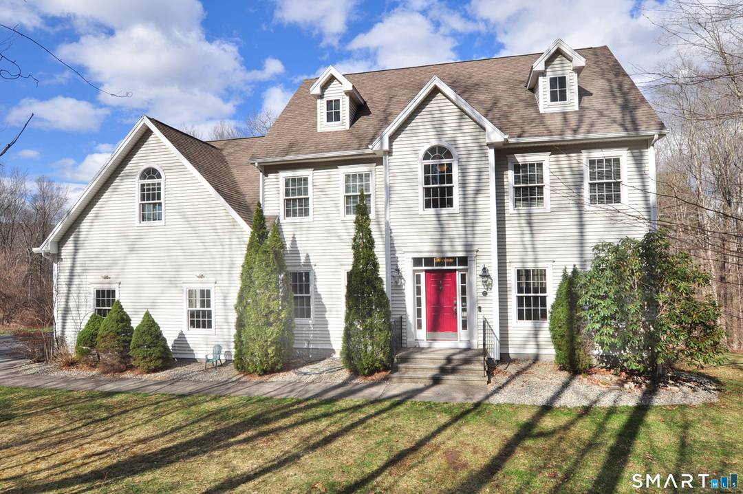 Nestled on more than 2 private wooded acres, along a scenic tree lined country road, this stunning Colonial offers the perfect blend of privacy, comfort and convenience.