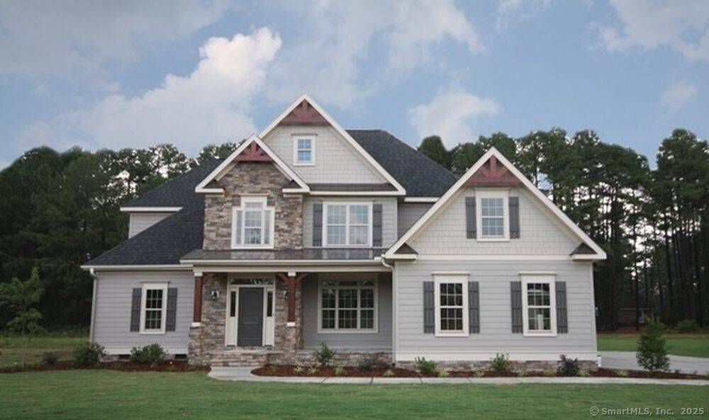 10 Metacomet Lane off of Newgate Road is the last lot in this beautiful neighborhood and ready to go for a new custom home.