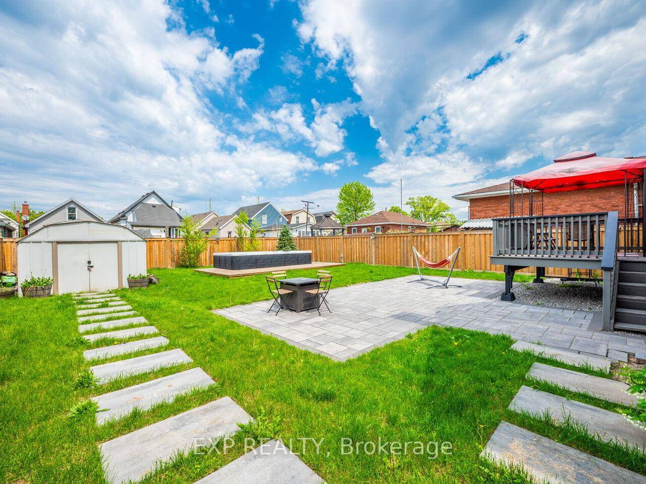 Welcome home to this beautifully updated 1 1 2 storey home with a rare 50 foot frontage and backyard oasis.