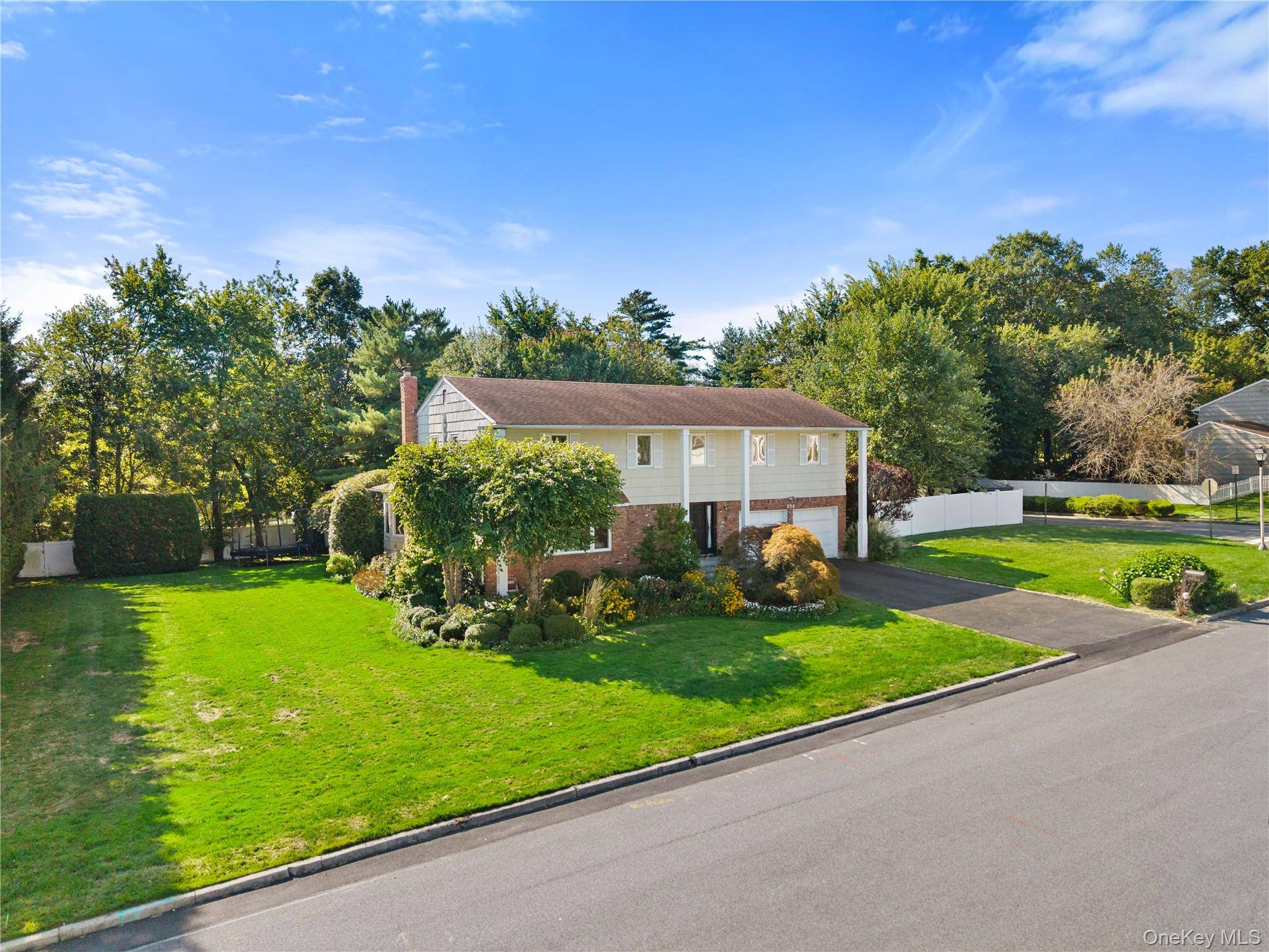 Welcome to 225 Country Ridge Road, located in the highly sought after Bloomingdale Estates.