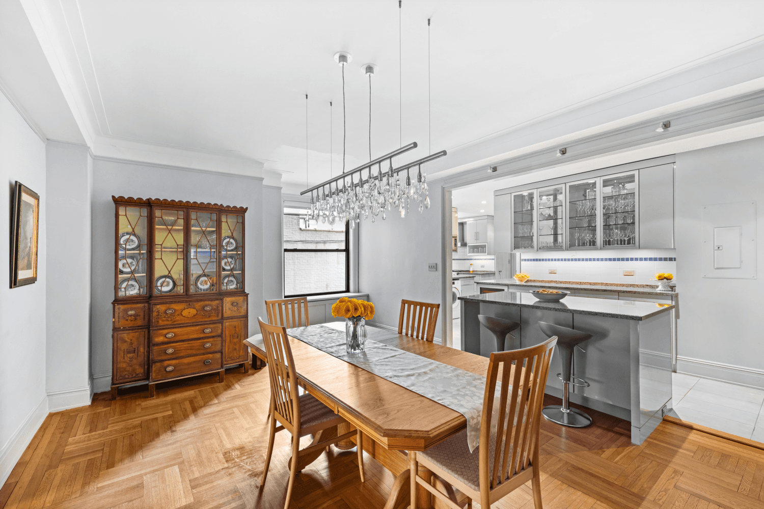 This beautifully laid out prewar 8 into 7 rooms offers fabulous sun and light including 3 bedrooms, 3 bathrooms, a staff room office 4th bedroom in this classic Rosario Candela ...