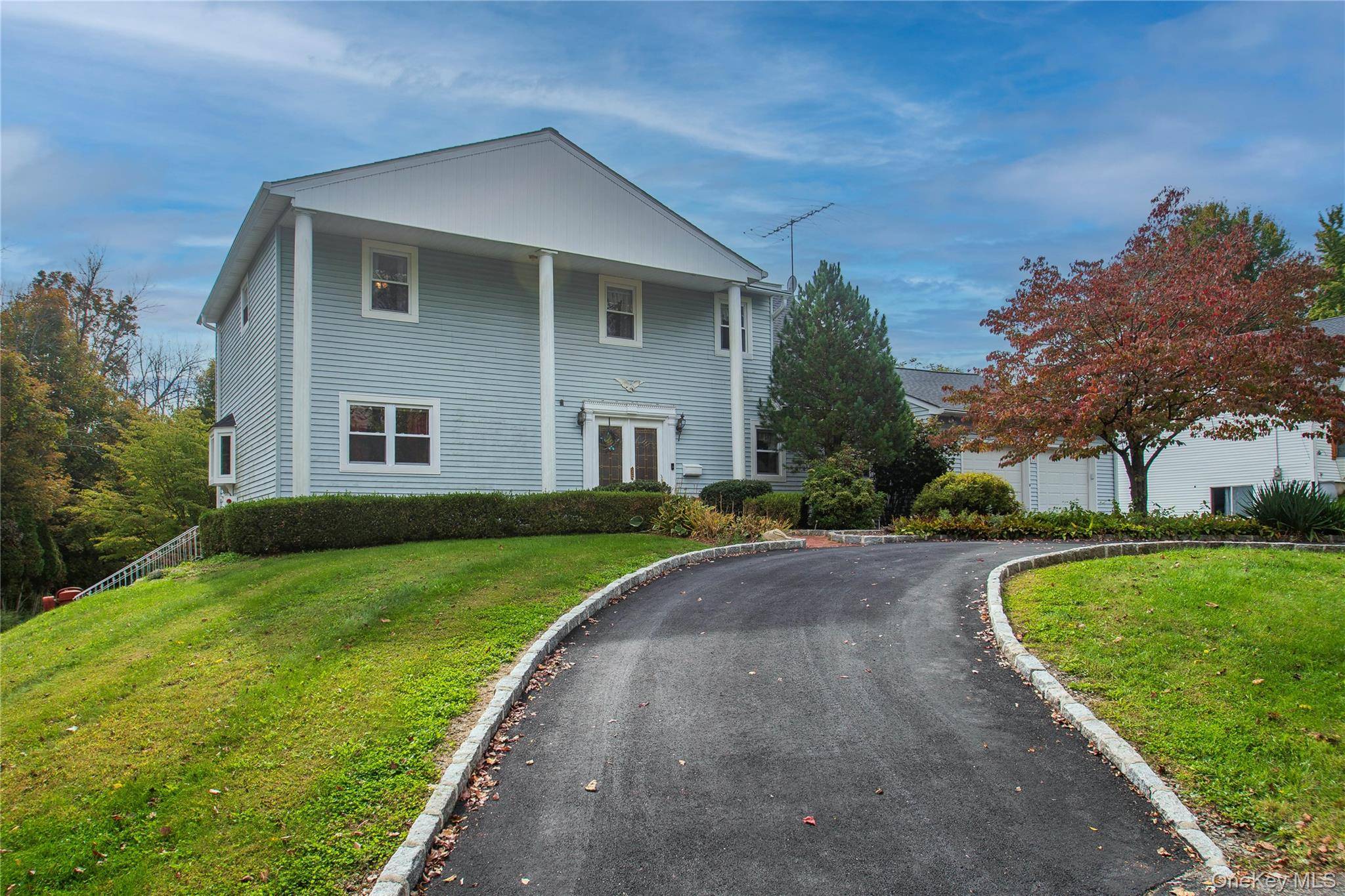 Imagine a stunning center hall colonial, with a walkout basement boasting four generous bedrooms, with the possibility of two more, complemented by 3.