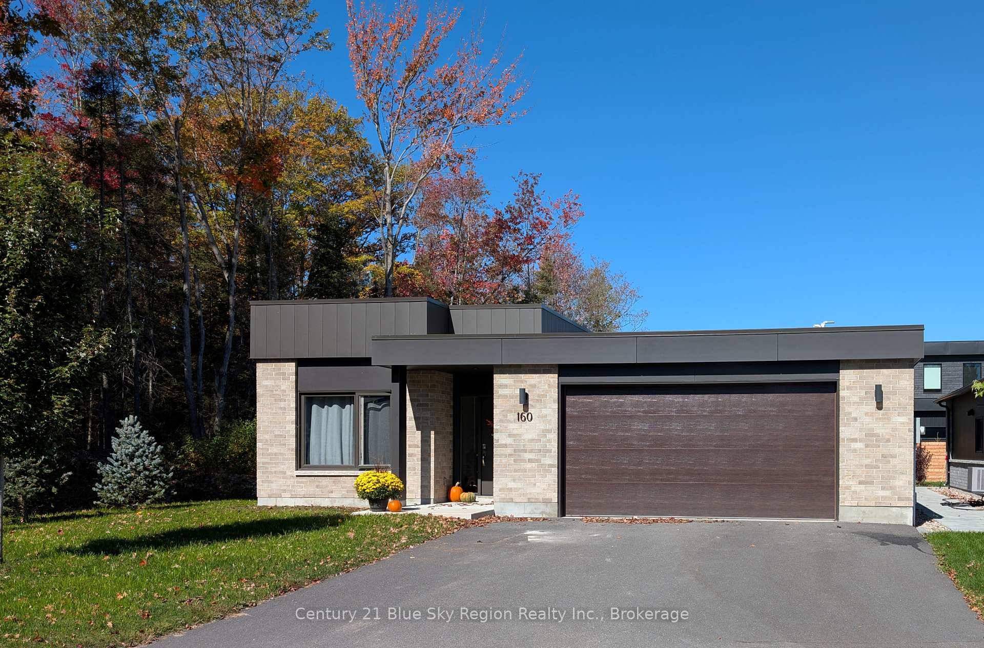 Custom Built All Brick bungalow with heated floors and gas furnace AC system.
