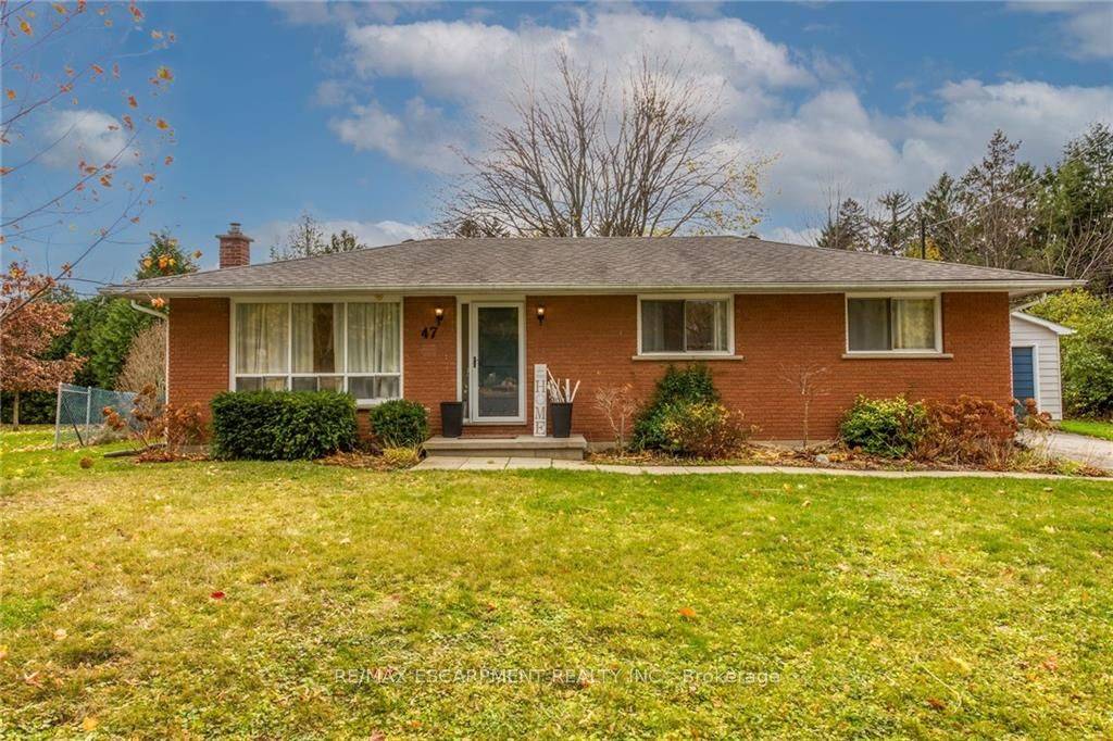 Stunning, Tastefully updated 4 bedroom, 2 bathroom all brick Bungalow located in one of Simcoe's premier neighborhoods on a premium lot with no rear neighbors.