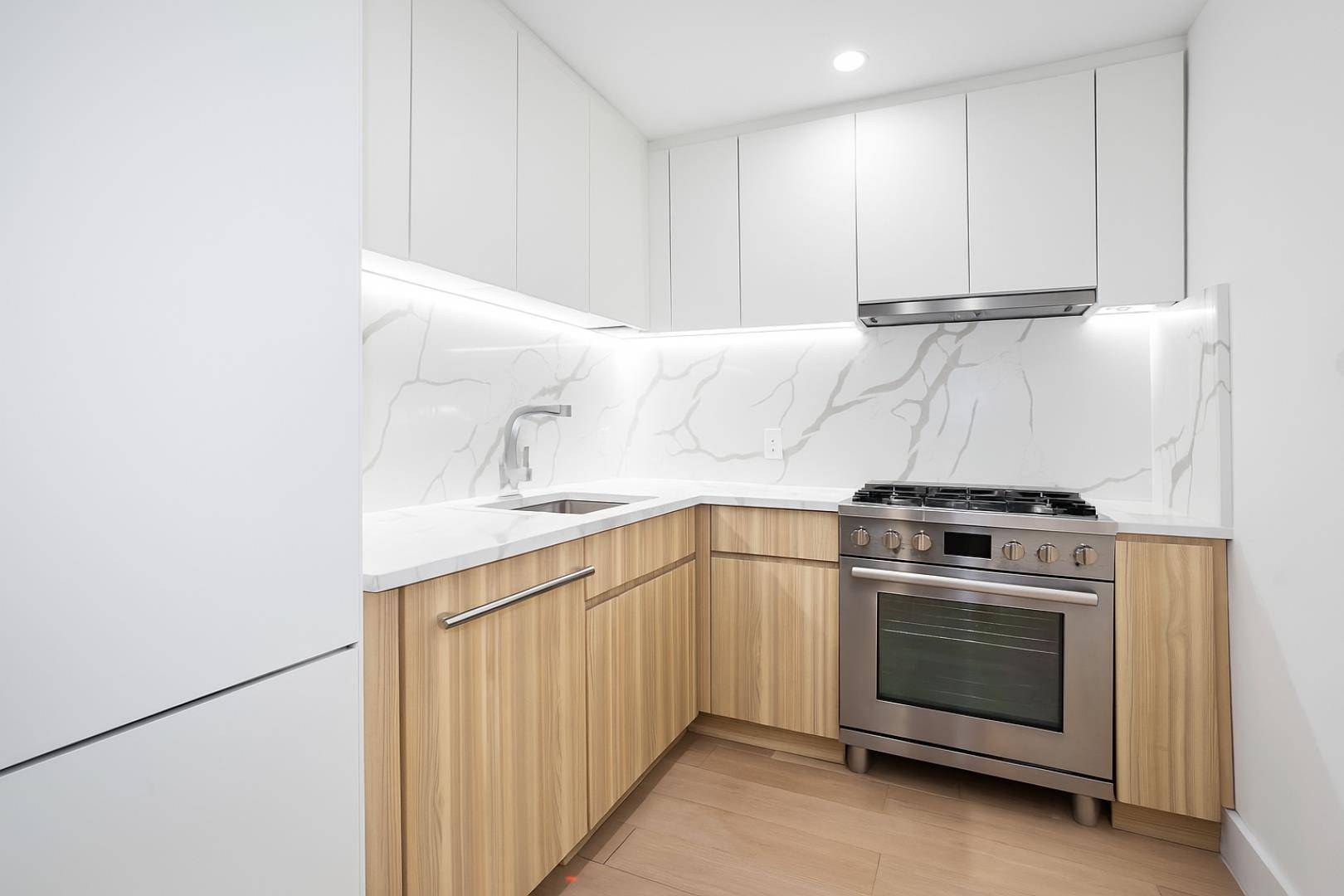 Welcome to Apt 5A at The Fifth Avenue Condominium, where luxury living meets an unbeatable location.