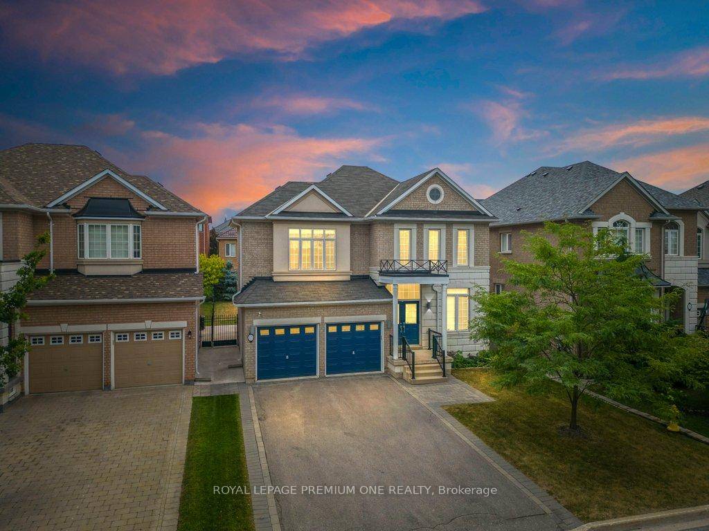 This stunning Woodbridge home offers castle like curb appeal with its timeless stone and brick fac ade, setting the tone for the beauty within.