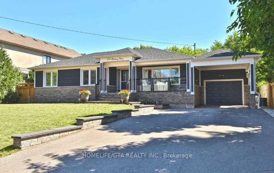 Bungalow on an enormous 75' X 15' lot on highly desired South Oak St.