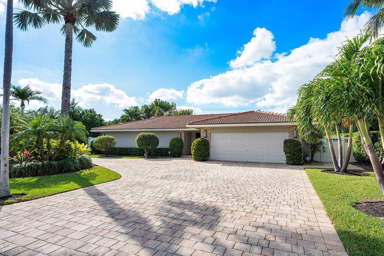 Coastal Luxury Living at its Finest Just Steps from the BeachNestled in the prestigious Estate Section, 1701 Cocoanut Road offers the quintessential seaside retreat only 100 yards from private beach ...