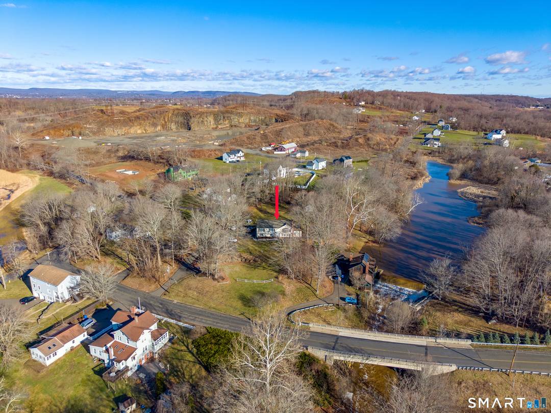 Welcome to this oversized raised ranch privately set back on over 1 acre of serene land, offering over 3, 000 sq ft of versatile living space.