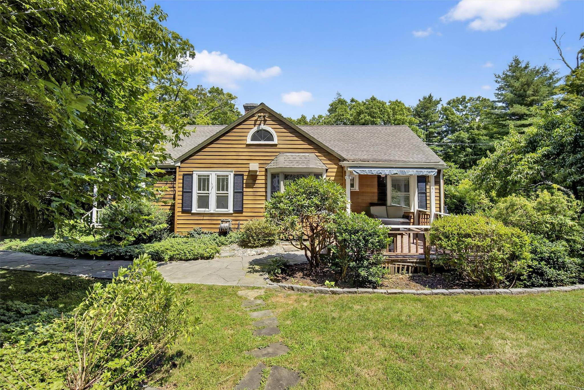 Once in a lifetime opportunity to own this truly enchanted cottage, nestled in a magical, private setting within one of the Hudson Valley s most sought after lake communities.