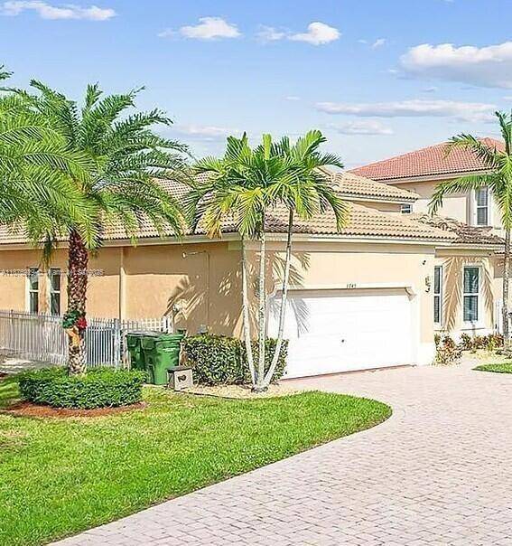 Live in Paradise at Portofino Lakes in Waterstone.