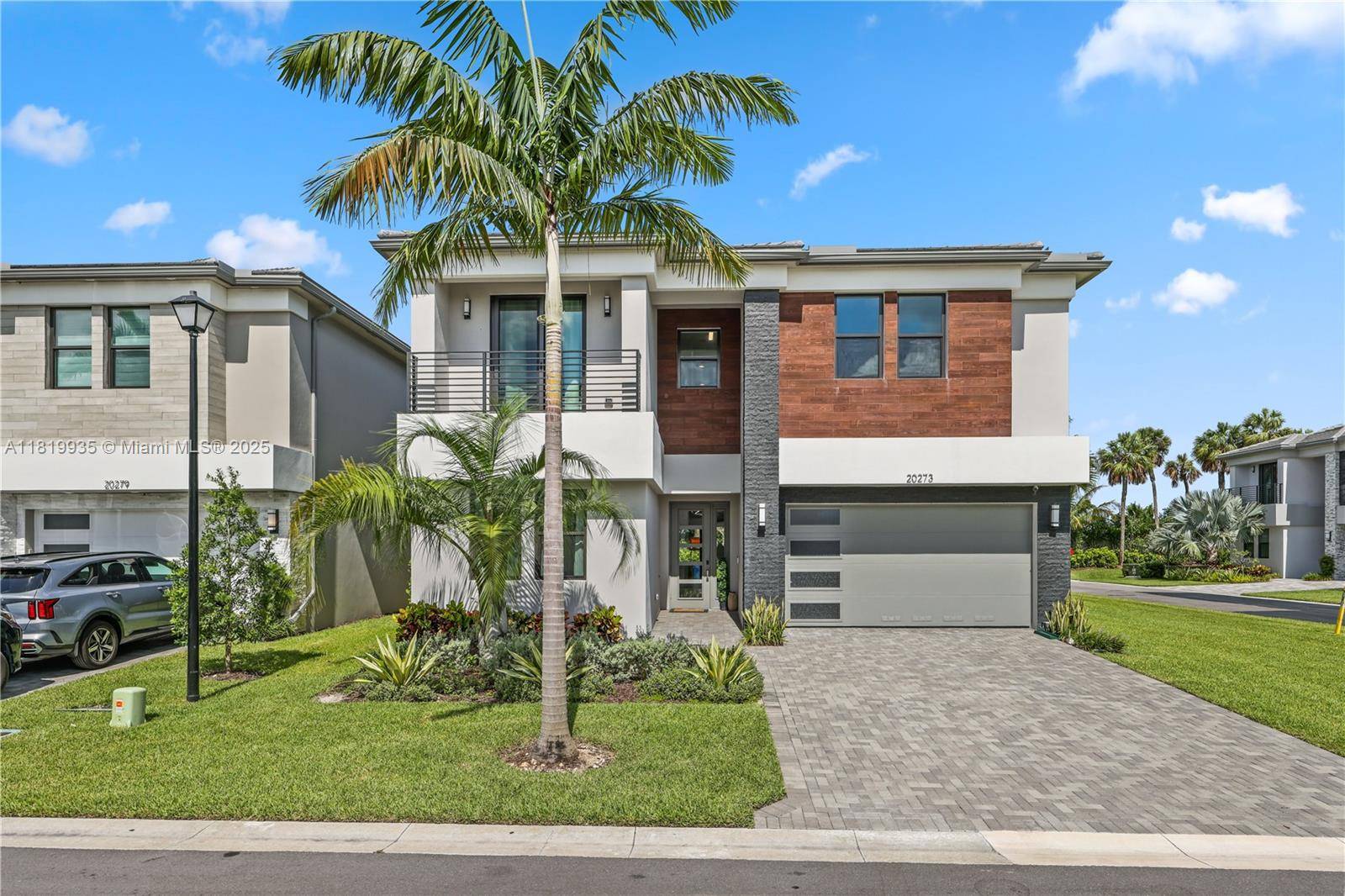 Experience luxury in the sought after Lotus Palm with this stunning Polynesia model, the largest in the Fiji Collection, on a spacious corner lot with lots of private parking.