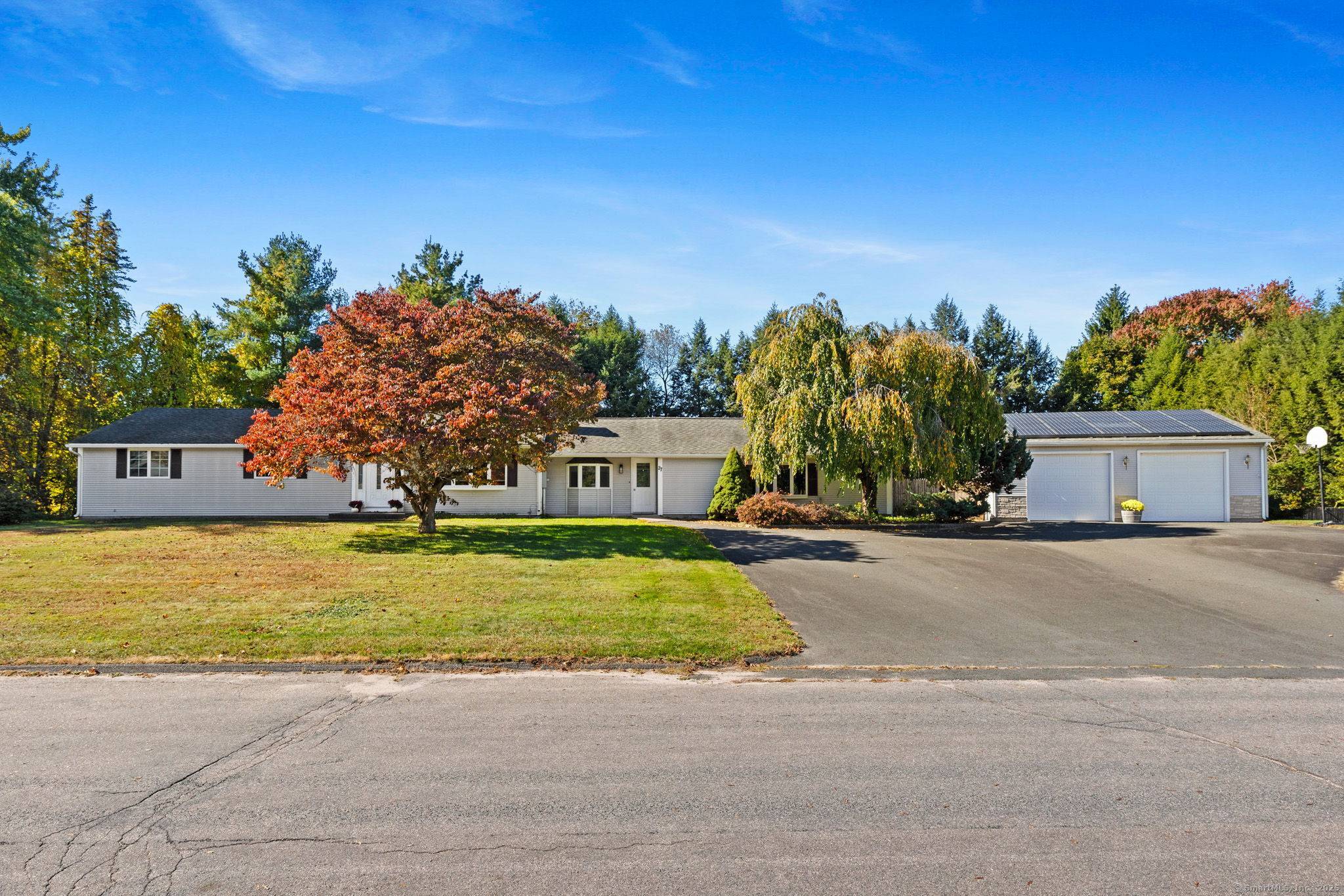 Beautifully updated 3 4 bedroom home with modern features, outdoor living space, and a private in ground pool in desirable Broad Brook !