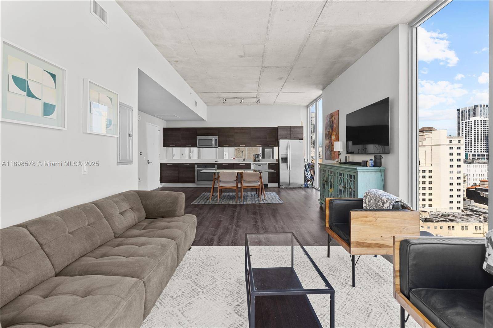 Originally a two bedroom, this corner residence has been reimagined into a spacious loft style layout, blending openness with flexibility.