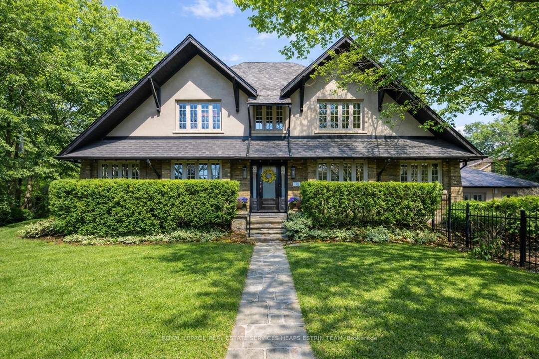 Stunning North Rosedale residence, ideally situated in the heart of the neighbourhood on a sun filled corner lot, enveloped by mature trees.