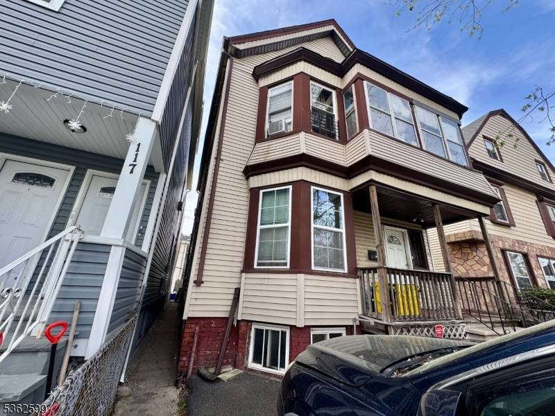 Recently Renovated Two Family Home Move in Condition Located near Branch Brook Park, Garden State Parkway Route 280 Features Hardwood Floors, Central Heat much more