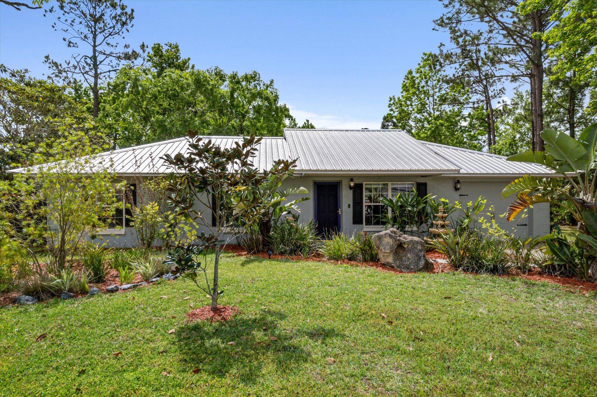 Welcome to this beautifully maintained 3 bed, 2 bath pool home on a rare DOUBLE LOT over half an acre with endless potential !