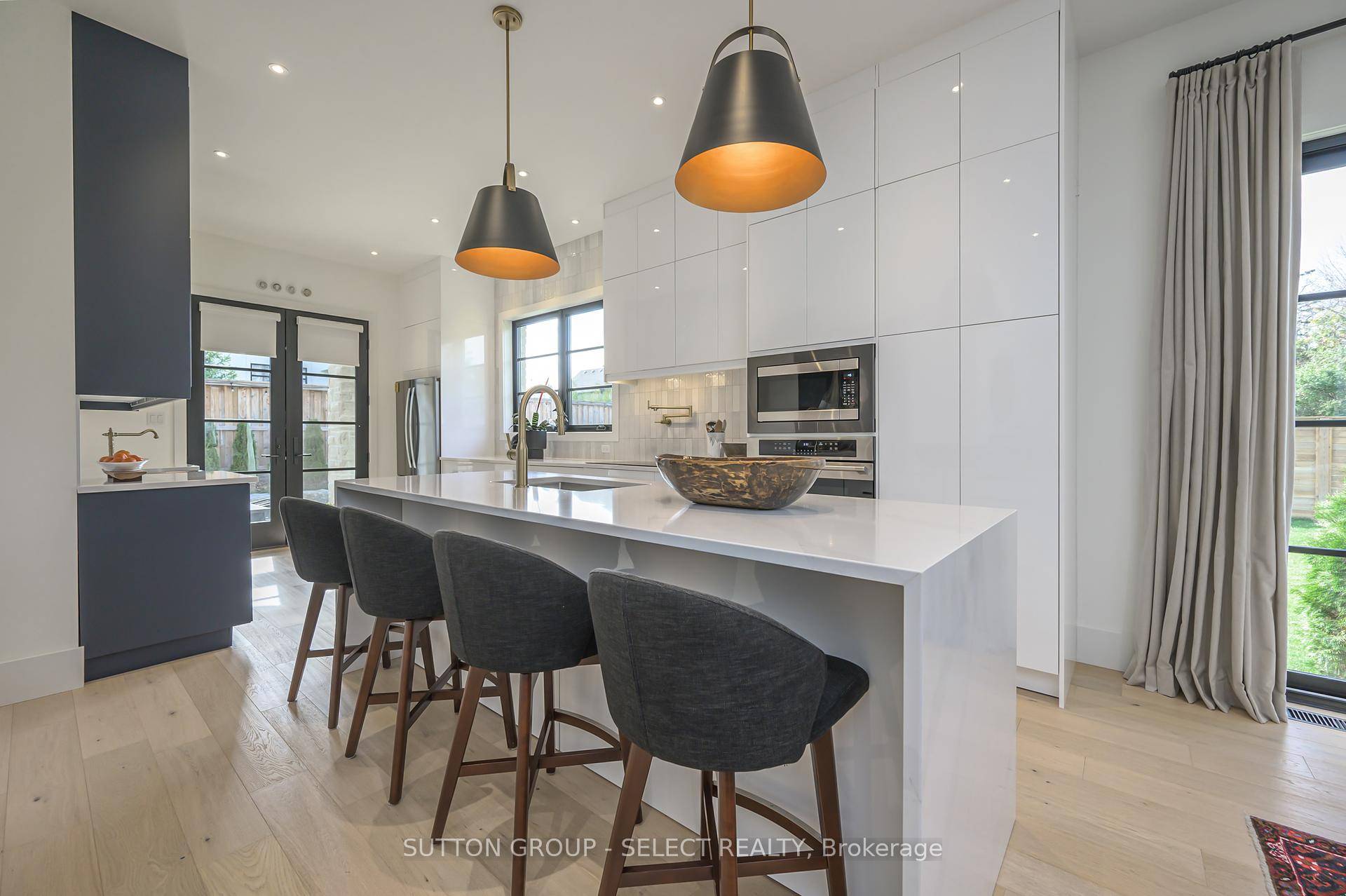 Custom modern European design meets multi generational luxury in this exceptional executive residence, perfectly suited for extended family, dual living, or income potential.