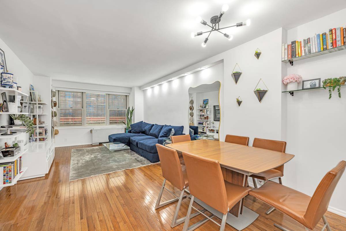 Move in ready sunny and spacious, recently renovated, one bedroom with over 30 feet of living dining space !