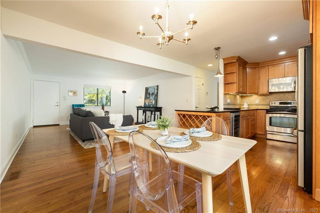 Experience modern comfort and style in this spacious ranch style condo, perfectly situated in a sought after gated community in mid city Stamford.