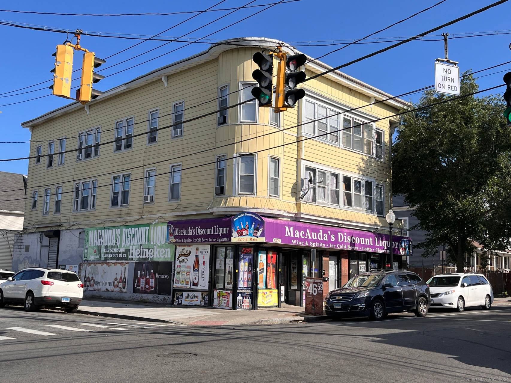 Great opportunity for an investor or owner occupation for this commercial building, with the liquor store on the first floor, and four three bedroom apartments on the second and third ...