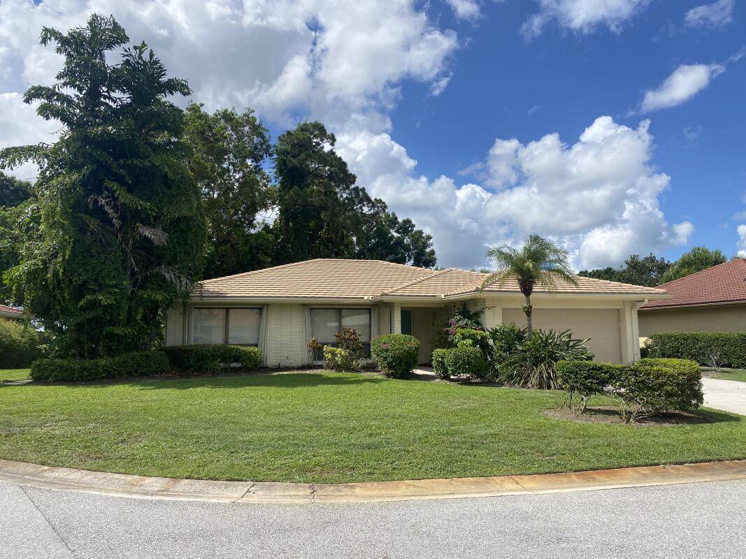 Open Living Dining room area with Vaulted Ceilings, Bonus Family room w sliding glass doors for privacy, screened in porch w Sliding Glass Doors to dining room and kitchen, walk ...