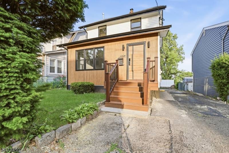 Welcome to 1439 Compton Ter, a beautifully renovated Colonial blending modern style, spacious living, and thoughtful design in Hillside.