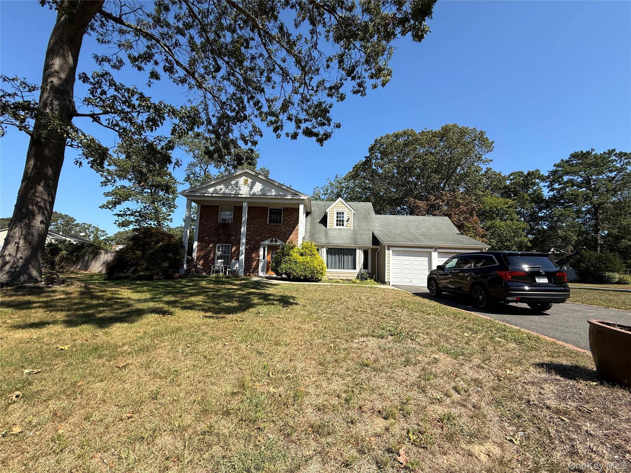 Welcome to this charming home located on a quiet residential block in Coram !