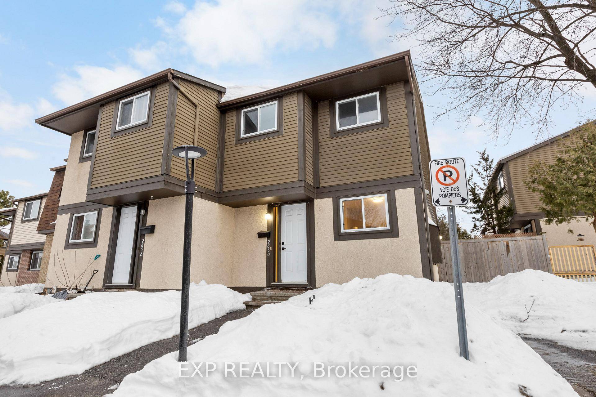 You'll love this charming end unit condo townhouse, which features three inviting bedrooms and 1.