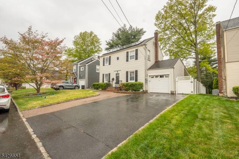 This move in ready Colonial is bursting with warmth and personality, featuring beautiful wood flooring that flows throughout a layout designed for both comfort and connection.