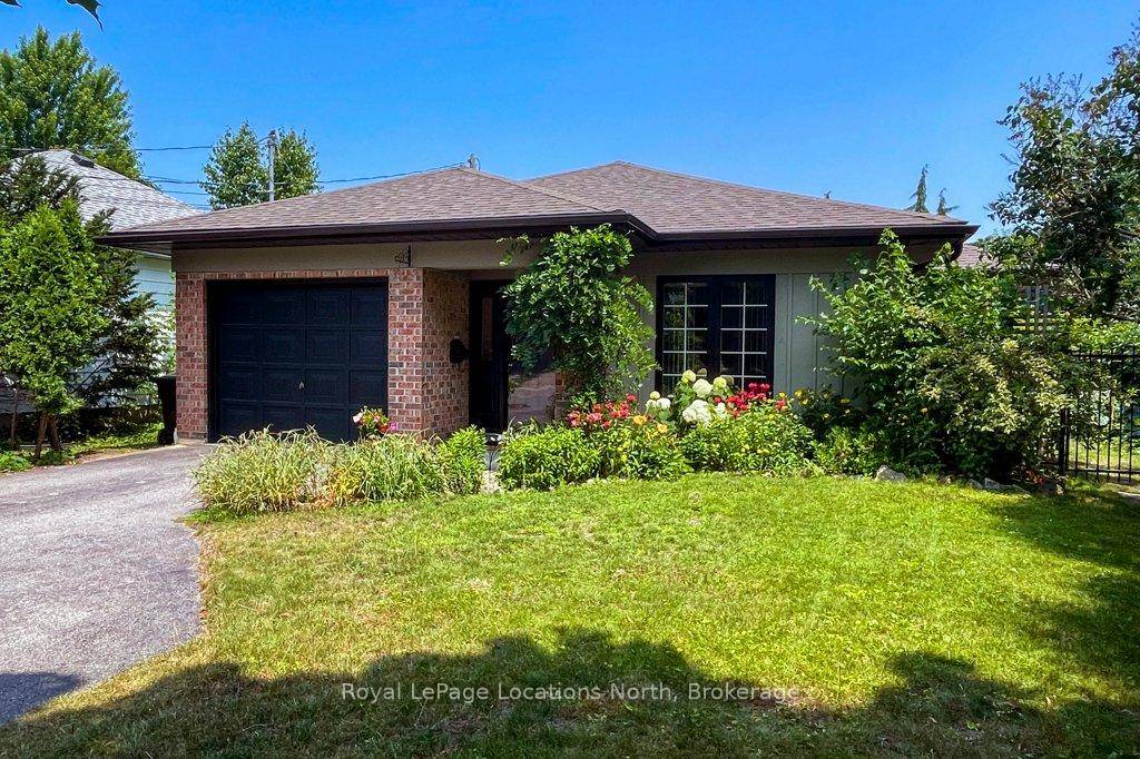 This inviting bungalow offers over 1000 square feet of main floor living plus an incredible 3 season glass terrace.