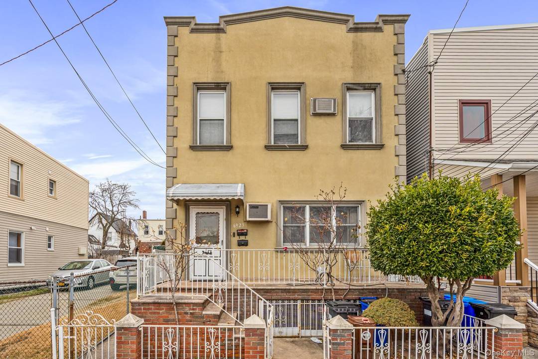 Opportunity awaits at this spacious two family home in the heart of Maspeth.