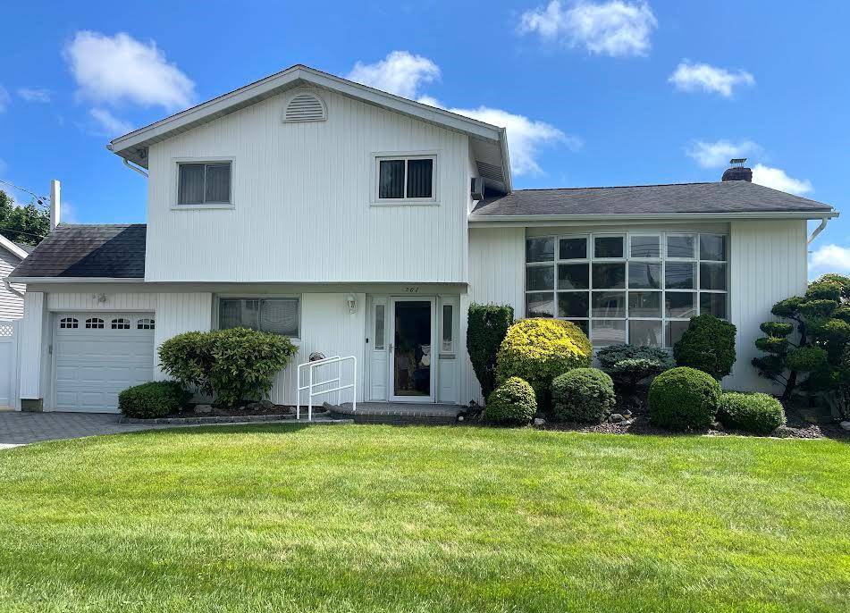 Step into this classic 4 bedroom, 2 bathroom split level home, ideally situated mid block on a quiet tree lined street.