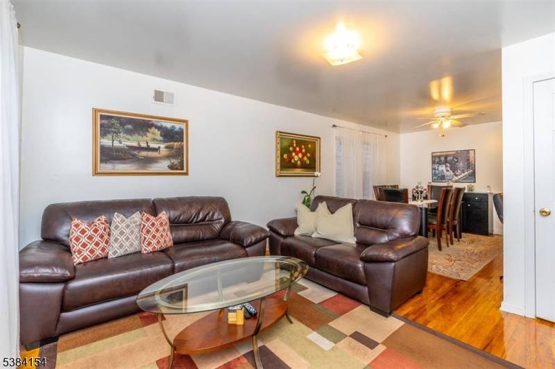Welcome to this beautifully designed, two family home located in a prime residential area of Elizabeth.