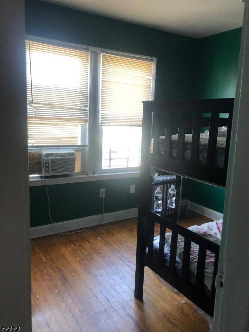 Spacious one family with recess lighting, featuring large living room.