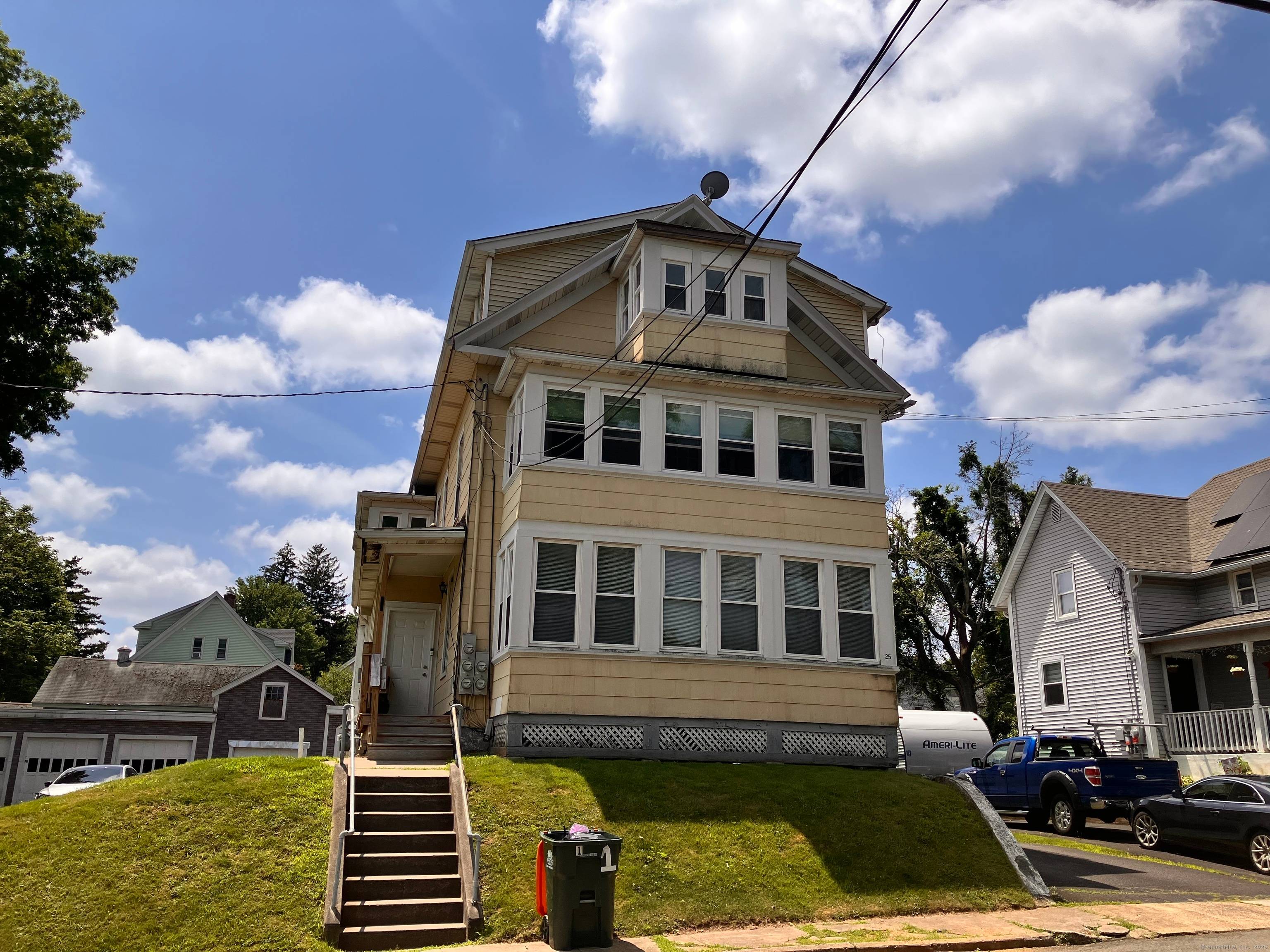 4 family home located on a quiet dead end street near downtown Meriden.